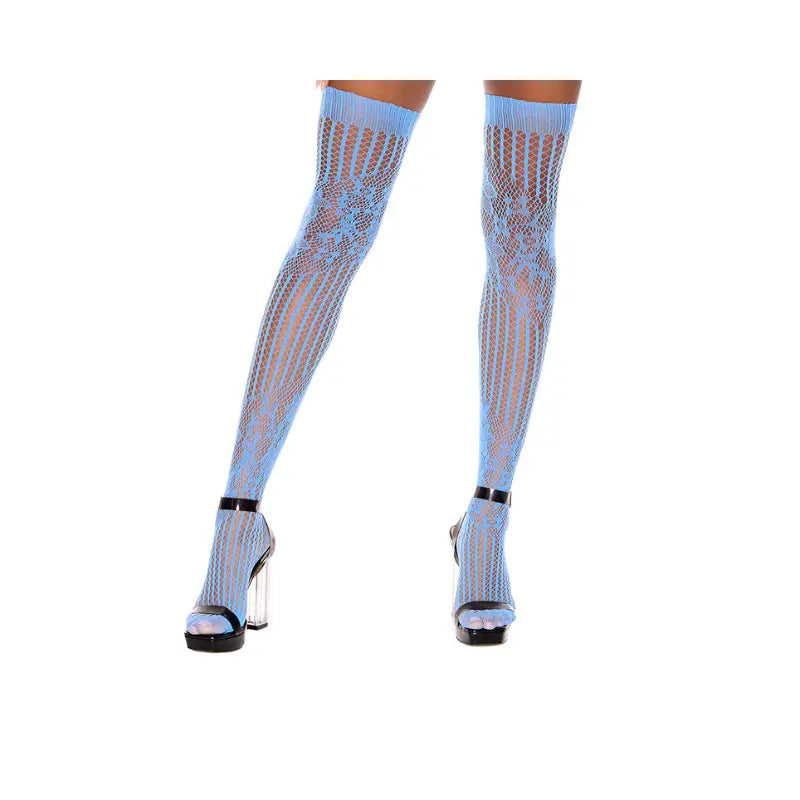 Close up front view of light blue fishnet thigh-high stockings worn with high-heeled shoes on a white background